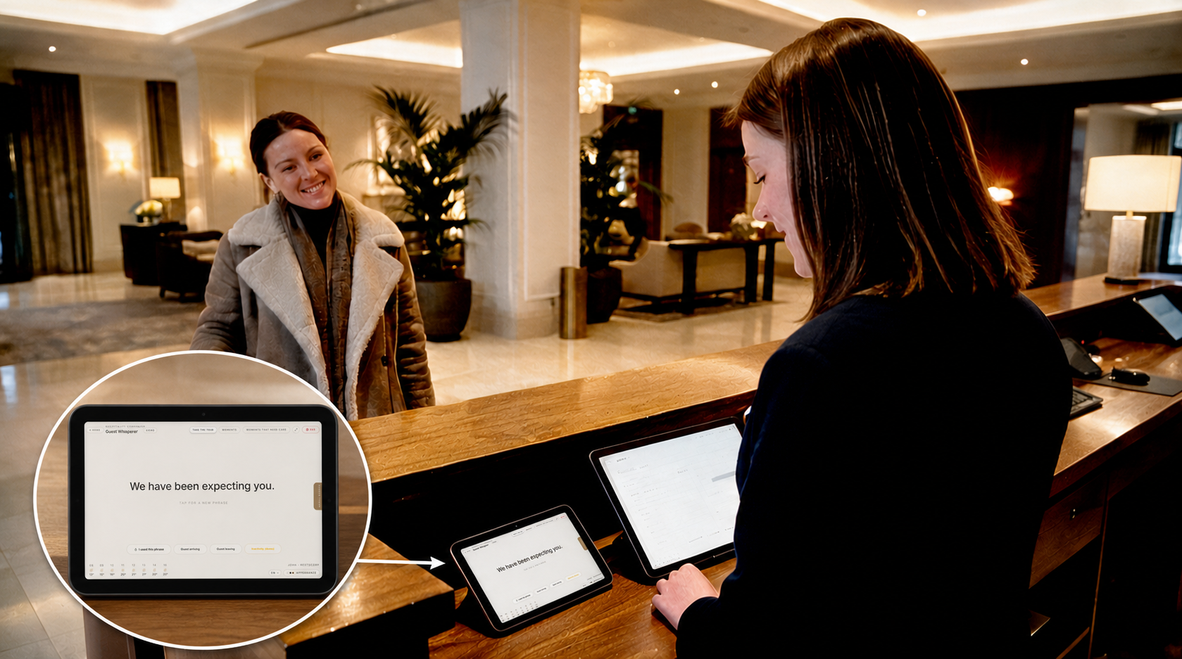 Hotel receptionist greeting a guest at the front desk, with a Guest Whisperer screen showing a welcome phrase.